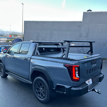 High Heavy Duty Load Bars and Ruggedized Manual Roller Shutter for Toyota Hilux Travo 2026 Double Cab