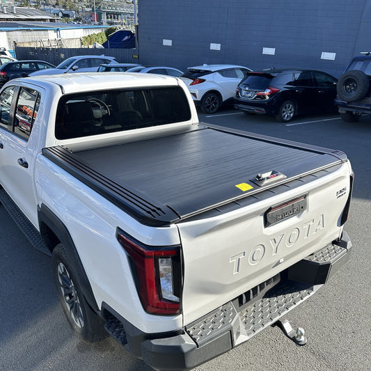 Ruggedized Manual Roller Shutter/Tonneau Cover for Toyota Hilux Travo 2026